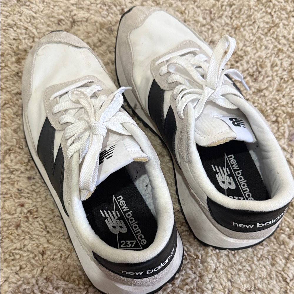New Balance women's  White and Black 237 Sneakers